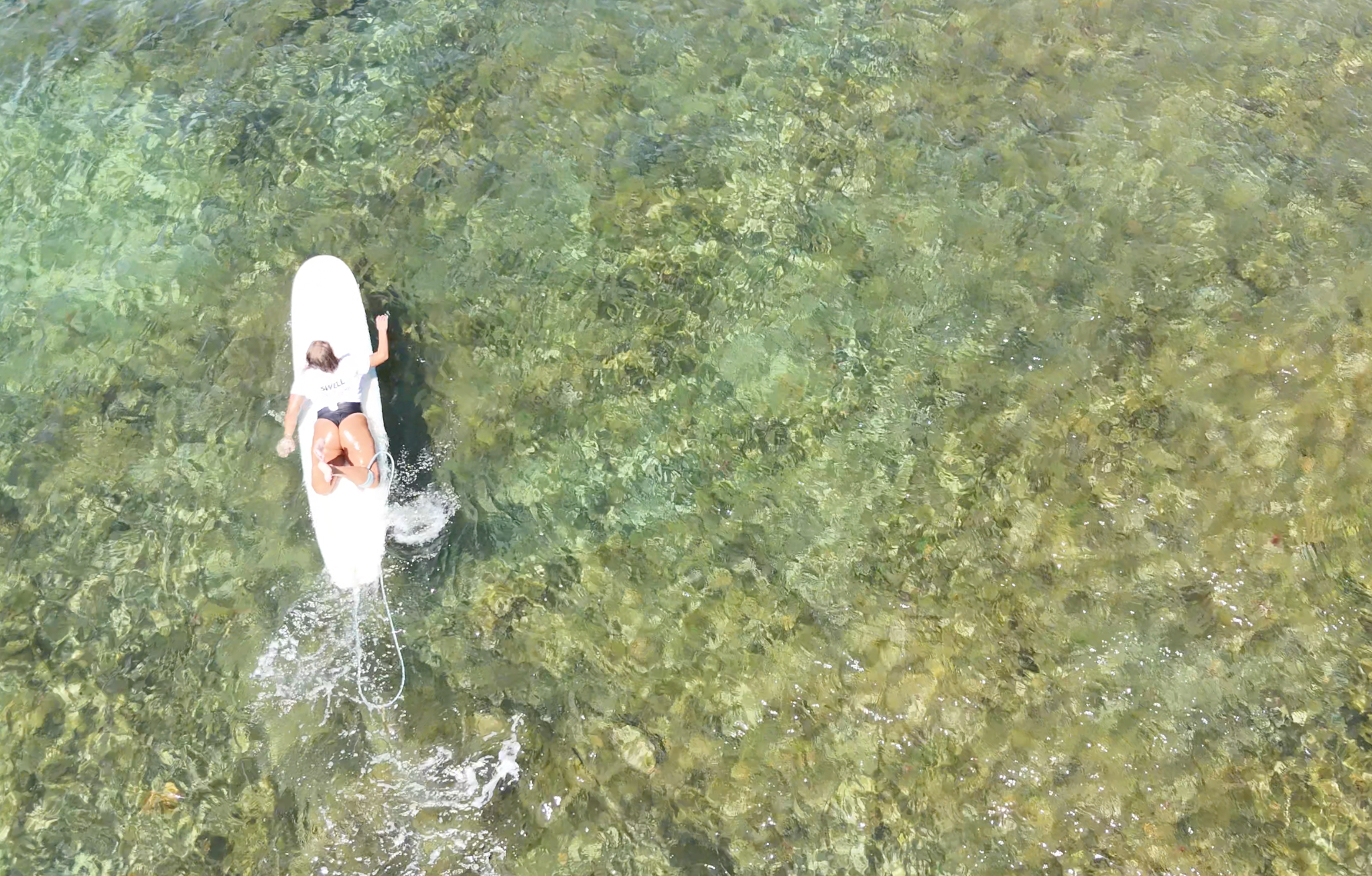 Advanced surfer filmed from above for video analysis